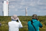 Photographers capture the Boeing Starliner capsule atop an Atlas V rocket as it is rolled out to the launch pad at Space Launch Complex 41, Saturday, May 4, 2024, in Cape Canaveral, Fla.