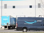 An Amazon delivery truck drives past Amazon's JFK8 Staten Island fulfillment center on March 25, 2022. Workers voted to unionize the warehouse, creating the first union at Amazon in the U.S.