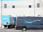 An Amazon delivery truck drives past Amazon's JFK8 Staten Island fulfillment center on March 25, 2022. Workers voted to unionize the warehouse, creating the first union at Amazon in the U.S.