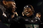 Oregon linebackers Dylan Williams, left, and Kamar Mothudi celebrate after winning an NCAA college football game against Ohio State, Oct. 12, 2024, at Autzen Stadium in Eugene, Ore.