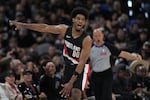Portland Trail Blazers guard Scoot Henderson (00) celebrates a score against the San Antonio Spurs during the second half in Game 2 of a first-round NBA playoffs basketball series in San Antonio, Tuesday, April 21, 2026.