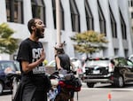 Portland rapper and activist Glenn Waco helped lead the group in chants. "I am!" he yelled, while the crowd responded, "Michael Brown!" 