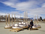 Oregon artist Julian watts with several pieces of "Groves and Stones," a seating structure destined for installation in Bellevue, Washington. Baker City, OR, Spring 2023