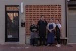 From left to right, Paola Velez, Pedro Tobar, Erik Bruner-Yang and Daniel Gonzalez pose for a photo outside the newly opened alley bar Providencia, in Washington, D.C., on Dec. 12.