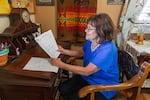 Irene Gilbert, a member of the Stop B2H coalition, reviews official documents at her desk in her La Grande, Oregon home on June 10, 2025. Gilbert has spent years researching and filing public records requests related to the proposed Idaho Power transmission line, becoming one of the coalition’s most knowledgeable and persistent watchdogs in the fight to protect eastern Oregon’s landscapes.