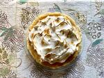 Rhubarb meringue pie on a table.