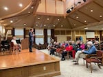 Rep. Dean Phillips, D-Minn., speaks to residents at the RiverWoods retirement community in Exeter, N.H. on Dec. 8, 2023.