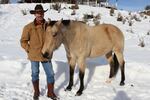 Tom Sharp with his horse, "Buck" at his ranch outside of Burns.