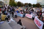 FILE - People protest against federal immigration enforcement Saturday, Nov. 15, 2025, in Charlotte, N.C. (AP Photo/Erik Verduzco)