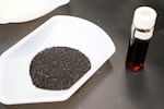 A sample of granular activated carbon, used to remove PFAS from water, on display during a tour of the U.S. Environmental Protection Agency Center For Environmental Solutions and Emergency Response, Feb. 14, 2023, in Cincinnati. Vancouver officials are investing in filtration systems that use granular activated carbon to pull PFAS out of its drinking water.