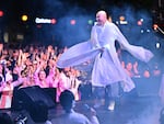 South Korean comedian Yoon Seong-ho, known as NewJeansNim, wearing monk's robes and performing during an electronic dance music party event for the annual Lotus Lantern Festival to celebrate the Buddha's birthday in Seoul, on May 12.