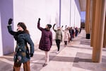 Performers dance outside of the the Kennedy Center in Washington, D.C. on Monday. The dance was part of a protest against executive orders signed by President Trump.