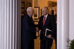 Just weeks after the 2016 election, Andrew Puzder shakes hands with then-Vice President-elect Mike Pence after a meeting with President-elect Trump at his golf club in New Jersey.