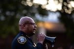 Seattle police chief Shon Barnes speaks to the crowd at a vigil honoring the 3 people who were shot and killed during Bite of Seattle the previous day, on Monday, July 27, 2026, at Seattle Center.
