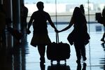 Travelers walk through Salt Lake City International Airport on May 24, 2024, in Salt Lake City.