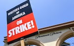 Screenwriters on strike protest in front of Paramount Studios on May 2, 2023 in Los Angeles, Calif.