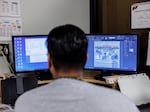 Patrick Bonga, a senior editor, works on the layout for the latest issue of the Prison Mirror at the Stillwater prison.