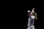 FILE: Mariel Zagunis of the United States celebrates after defeating Italy in a women's team sabre fencing bronze medal final at the 2016 Summer Olympics in Rio de Janeiro, Brazil, Saturday, Aug. 13, 2016.