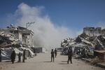 Smoke rises after an Israeli military strike on a building in Gaza City, Saturday, Sept. 13, 2025.