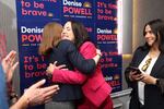 Denise Powell, candidate for the Democratic nomination to the House of Representatives in Nebraska's second district, right, hugs pollster Madeline Conway during an election night watch party Wednesday in Omaha, Neb.