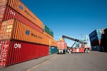 A reach stacker unloads a container from a truck at Terminal 6. Terminal 6 is the Columbia River’s only deep-draft container terminal, supplying efficient, local access to international markets for regional businesses.