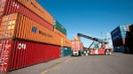 A reach stacker unloads a container from a truck at Terminal 6. Terminal 6 is the Columbia River’s only deep-draft container terminal, supplying efficient, local access to international markets for regional businesses.