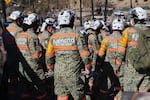 Search and rescue crews from Mexico inspect a mobile home park destroyed by the Palisades Fire in Palisades, Calif., Wednesday, Jan. 15, 2025. (AP Photo/Ty ONeil)