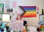 Teacher Brooke Birch sits at their desk at Rosemary Anderson High School’s east campus.