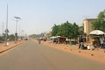 FILE - Motorcyclist ride along a street in Niamey, Niger, Thursday, June 18, 2026.