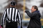 Lake Oswego head coach Steve Coury argues with the referee over a blown whistle. A mix up between the referees’ whistle and a whistle blown from the stands led to the Rams to halt play, leading to a touchdown for Central Catholic. The Central Catholic Rams played the Lake Oswego Lakers at Hillsboro Stadium in Hillsboro, Oregon, on Dec. 7, 2019. The Rams defeated the Lakers 49-28.
