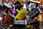 Hershey Co. is introducing more non-chocolate candies to its lineup as costly chocolate candy curbs the company's sales revenue.