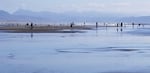 People gather near Fort Stevens State Park along the northern Oregon coast on Saturday, March 21, despite Gov. Kate Brown's request to "stay home, stay safe."