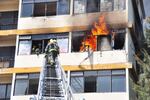 Firefighters participate in a high-rise firefighting training in Latin America in 2012.