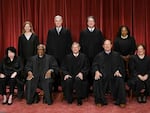 Justices of the US Supreme Court pose for their official photo at the Supreme Court in Washington, DC on October 7, 2022. - (Seated from left) Associate Justice Sonia Sotomayor, Associate Justice Clarence Thomas, Chief Justice John Roberts, Associate Justice Samuel Alito and Associate Justice Elena Kagan, (Standing behind from left) Associate Justice Amy Coney Barrett, Associate Justice Neil Gorsuch, Associate Justice Brett Kavanaugh and Associate Justice Ketanji Brown Jackson. (Photo by OLIVIER DOULIERY / AFP) (Photo by OLIVIER DOULIERY/AFP via Getty Images)