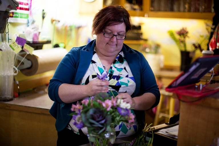 Erin Zygaitis is a floral manager at Rhythm & Blooms flower shop in Eugene, which recently began offering paid sick time. Before that, Erin says, "it was difficult. I got pretty sick a year and a half ago and I had bronchitis, but I couldn't really afford to take the time off to get better and I had it for about three and a half or four months."