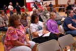 Community members at a fire information meeting in Fossil, Ore., on Tuesday evening, July 21, 2026.