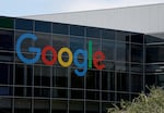 A sign is posted on the exterior of a building on the Google headquarters campus Mountain View, California. Google parent company Alphabet reported better-than-expected second-quarter earnings with revenue of $96.43 billion compared to analyst expectations of $94 billion.