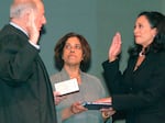 Harris takes the oath of office as San Francisco's district attorney on Jan. 8, 2004. Her mother, Dr. Shyamala Gopalan, holds a copy of "The Bill of Rights."