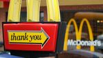 FILE - This Wednesday, Oct. 14, 2009 file photo shows the red and yellow signs with the trademark golden arches a McDonald's in Pittsburgh. McDonald's on Tuesday, Oct. 21, 2014 said a key sales figure declined 3.3 percent in the U.S., marking the fourth straight quarter of declines for the world's biggest hamburger chain. (AP Photo/Keith Srakocic, File)