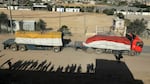 A truck carrying humanitarian aid enters the Gaza Strip via the Rafah crossing with Egypt, hours after the start of a four-day truce in battles between Israel and Palestinian Hamas militants, on Friday.