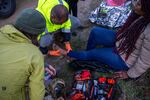 Members of the Borderlands Relief Collective attend to the wounds, hypothermia and hunger of migrants on Otay Mountain on Jan. 13, 2024.