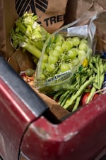 Fruits and vegetables in the back of Beverly Blagden’s truck as she leaves the Dallas Food Bank.