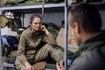 Yulia Brockdorf has made multiple trips to deliver humanitarian aid and provide counseling to soldiers on the frontline. She is shown here listening to a soldier from the Azov Brigade during a therapy session which took place during a visit to troops in Eastern Ukraine in November 2023.
