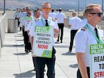 Delta pilots engaged in demonstrations at seven airports around the U.S. on Thursday calling for higher pay, among other things. This photo was taken at Salt Lake City International Airport.