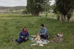 Women picnic while tending to cattle along the banks of the Dniester River in Bursuc, Moldova, May 14.