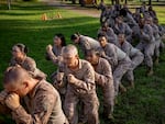 Marine recruits with Kilo Company 3rd Recruit Training Battalion work their way through drills in Leatherneck Square at Marine Corps Recruit Depot, Parris Island on August 22 in Beaufort County, S.C.