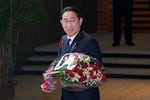 Shigeru Ishiba, top, ahead of the extraordinary session of parliament's lower house Tuesday, Oct. 1, 2024, in Tokyo.