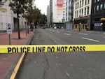 Several blocks of Southwest 4th Avenue remained closed to traffic Sunday, Sept. 30, 2018, as the investigation into a fatal police shooting which occurred in the area that morning continued.