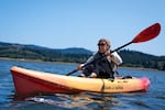 Elizabeth Clark enjoys a kayak tour of the Salmon River estuary on July 18, 2026.