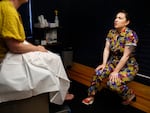 Dr. Stephanie Arnold, who prefers bright-colored clothes instead of a white coat, meets with a patient who needs a pelvic exam. The family medicine clinic Arnold founded offers reproductive health care, including abortion, alongside all kinds of other care. “It’s a little bit of everything, which is very typical of family medicine,” she says.